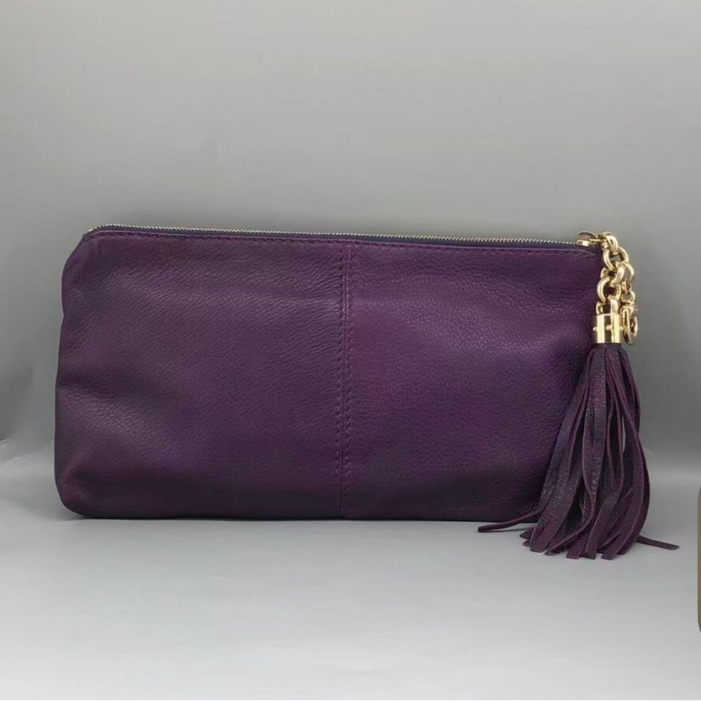 58. Gucci Sienna Tassel Clutch